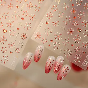 Red and gold firework nail stickers TL-452 with heart patterns on gradient festive nails