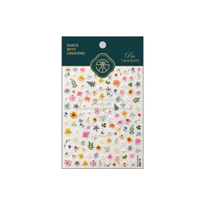 Floral nail art stickers with colorful Monet garden flowers and botanical leaf patterns