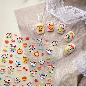 Detail view of cartoon dog nail art stickers with sweet apple and strawberry patterns