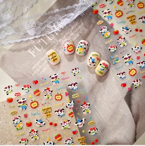 Detail of 3D embossed nail stickers with cute cartoon dogs and fruit patterns