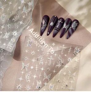 Detail of TL-187 laser silver butterfly nail stickers with gothic cross and star designs