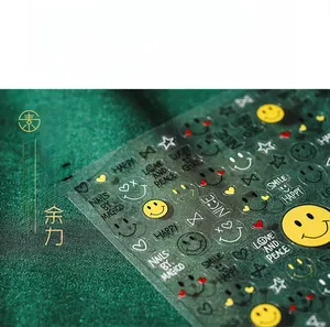 Detail of 5D embossed nail art stickers with cute yellow smiley faces and hearts