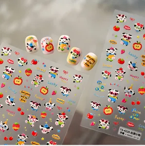 Detailed 5D embossed nail stickers featuring cute cartoon dogs and fruit patterns