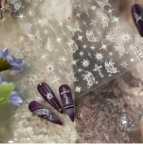 Laser silver butterfly and cross nail stickers on purple gradient manicured nails