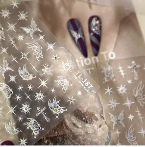 Close-up of laser silver butterfly and star nail stickers TL-187 with holographic effect