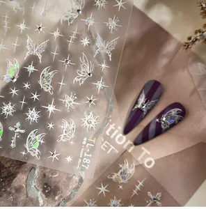Detailed holographic laser nail stickers featuring silver butterflies and star motifs