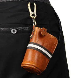 Brown genuine leather car key pouch with striped webbing and brass hook on waist