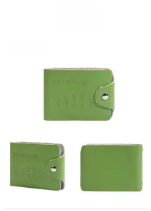 Close-up of green leather driver's license wallet featuring silver snap button closure