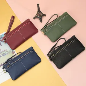Minimalist long leather wallet for women with stitch details in four elegant colors