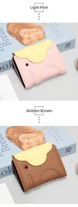 Macro detail of elephant cartoon leather card holder with premium lychee grain texture