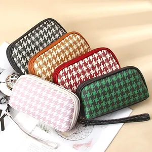 Fashionable houndstooth leather long wallets with zippers and wrist straps in five colors