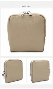Detalle del estuche de joyas en cuero gris claro con grano lichi y doble cremallera