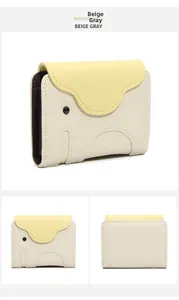 Detail of beige gray leather elephant card holder showing multi-angle views and texture