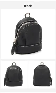 Detail of black lychee grain leather mini coin purse with silver zipper and D-ring hook