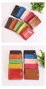 Detailed view of leather driver's license holders in multiple colors with snap button