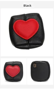 Detailed views of a mini black lychee leather coin purse with a red heart and metal ring