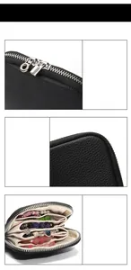 Detail der schwarzen Leder-Schmucktasche mit Metallreißverschluss und Innenfächern