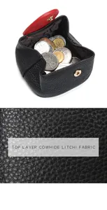 Detail of top layer cowhide litchi leather coin purse with contrast black and red finish