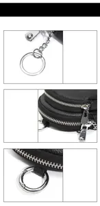 Detail van leren portemonnee met dubbele zilveren ritsen en metalen sleutelring hanger