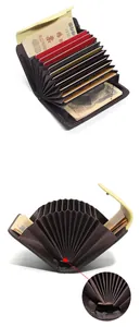Detail of genuine leather elephant card holder with accordion slots and snap closure