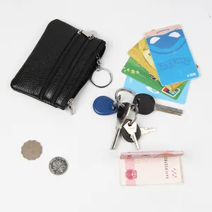 Mini portefeuille noir en cuir grainé avec trois fermetures éclair et porte-clés