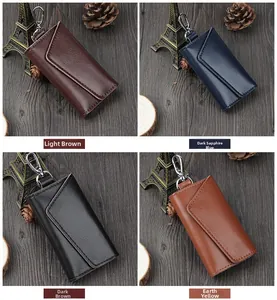Litchi pattern leather key pouches in light brown, royal blue, dark brown, and yellow