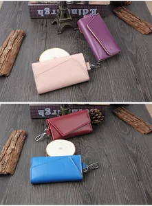 Litchi pattern leather key holders in purple, pink, red, and blue with metal hooks