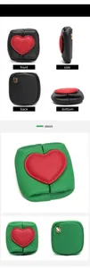 Detail view of mini leather coin purses with heart patches in green and black colors