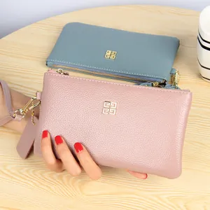 Women's genuine leather clutch bag with lychee pattern and wristlet strap