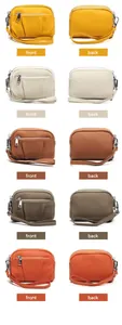 Detail view of genuine leather mini wallets with triple zippers in five vibrant colors