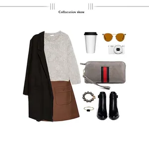 Flat lay of a genuine leather long wallet with striped webbing on a wool coat outfit
