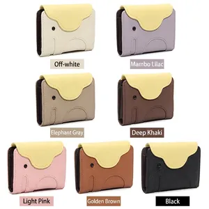 Cute elephant leather card holder wallets in seven vibrant colors on white background