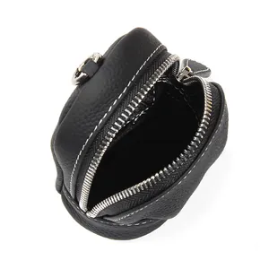 Mini round black leather coin purse with contrast stitching and silver keychain clip