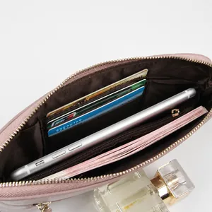 Pale pink genuine leather long wallet for women with zipper closure and phone compartment
