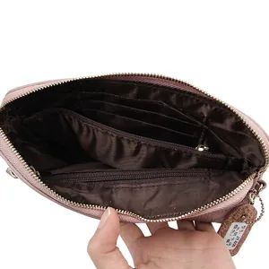Pink top grain leather long zip wallet for women with multiple card slots and interior storage