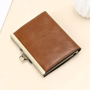 Vintage brown oil wax leather card holder with secure metal frame clasp closure