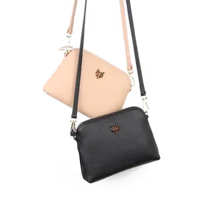 Women's genuine leather shell crossbody bag with metal fox head decor in black and pink