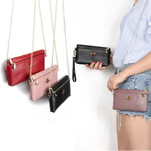 Classic bee crossbody chain bag in pebbled leather with vintage gold hardware
