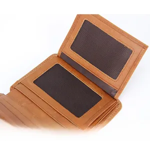 Detailed interior of brown leather wallet featuring dual mesh ID card slots and fine stitching