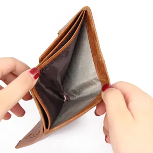 Brown crazy horse leather bi-fold wallet for men showing spacious interior cash compartment