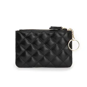 Black sheepskin quilted key pouch with gold zipper and chain for women