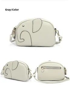Detailansicht einer grau-weißen Elefanten-Ledertasche mit hochwertiger Lychee-Narbung
