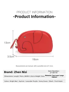 Detail view of the red leather elephant purse with gold zipper and 19x13x3.5cm dimensions