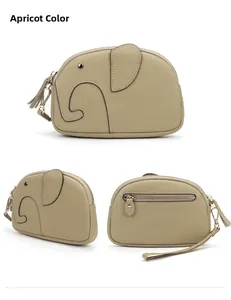 Detailed views of apricot elephant-shaped leather mini bag with zipper and hand strap