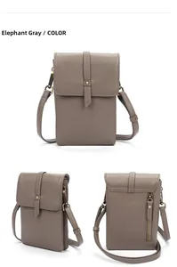 Detailed views of an elephant gray pebble leather phone bag with an adjustable strap