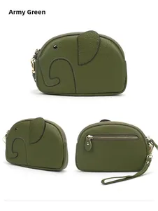 Detail view of army green elephant leather wristlet with litchi grain texture