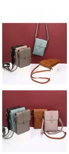 Detailed view of genuine leather phone bags in various colors on geometric display stands
