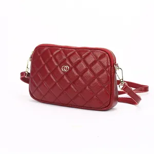 Deep red quilted genuine leather crossbody bag with golden hardware and chain strap