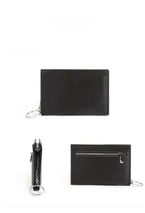 Three views of a black pebbled leather coin purse with zipper and metal key ring chain
