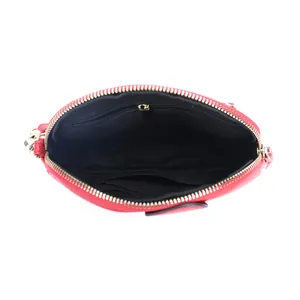 Red top-grain leather elephant purse with inner zipper pocket and lychee texture